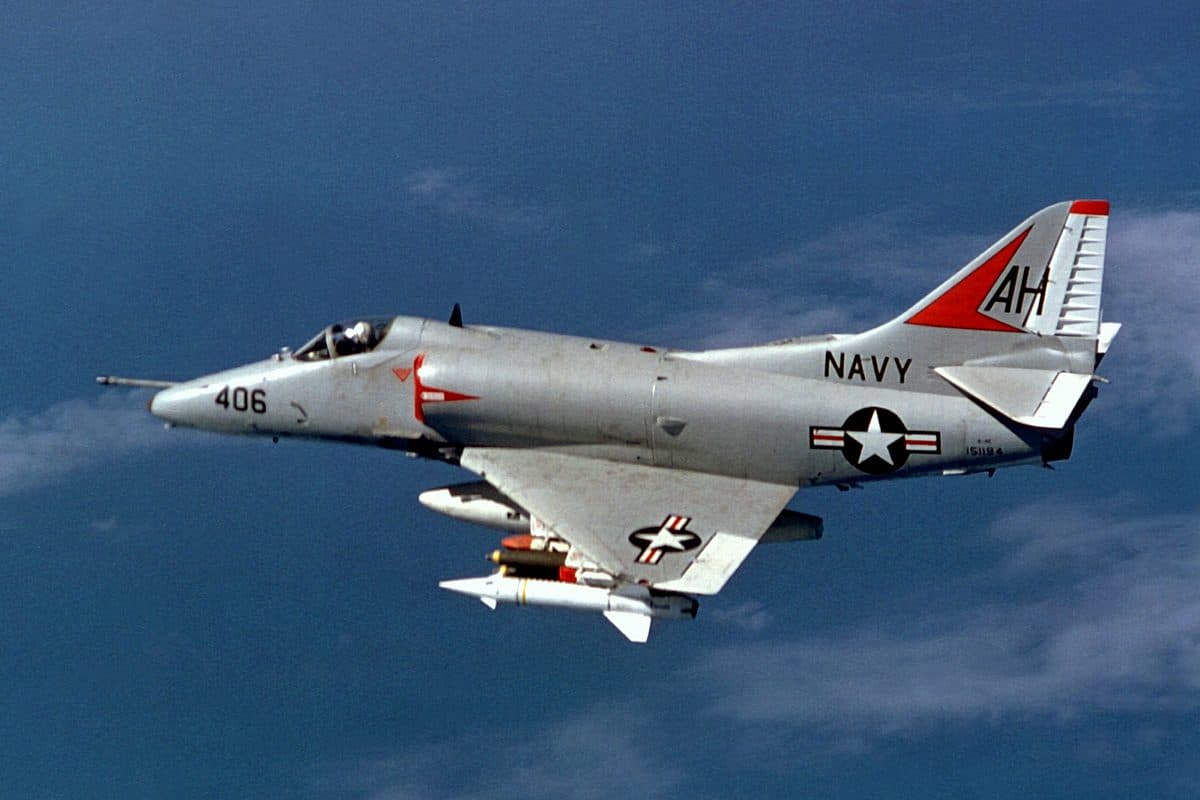 A-4 Skyhawk attack aircraft in flight showing its compact delta wing design and ordnance pylons