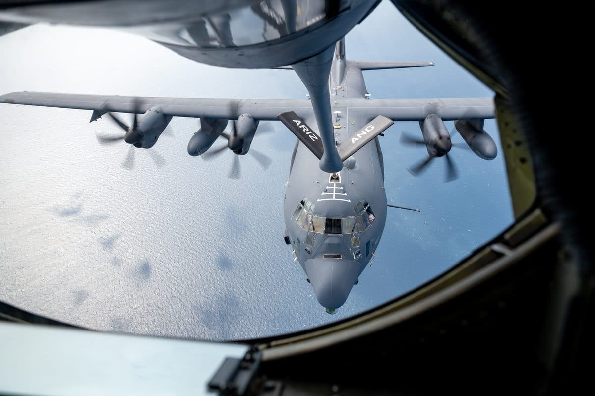 AC-130J Ghostrider gunship in flight showing its side-mounted weapons and sensor systems