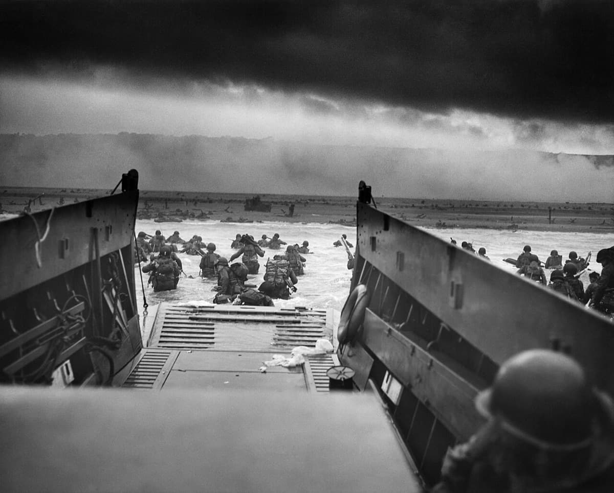 American troops wading toward Normandy beach from a landing craft on D-Day, June 6, 1944