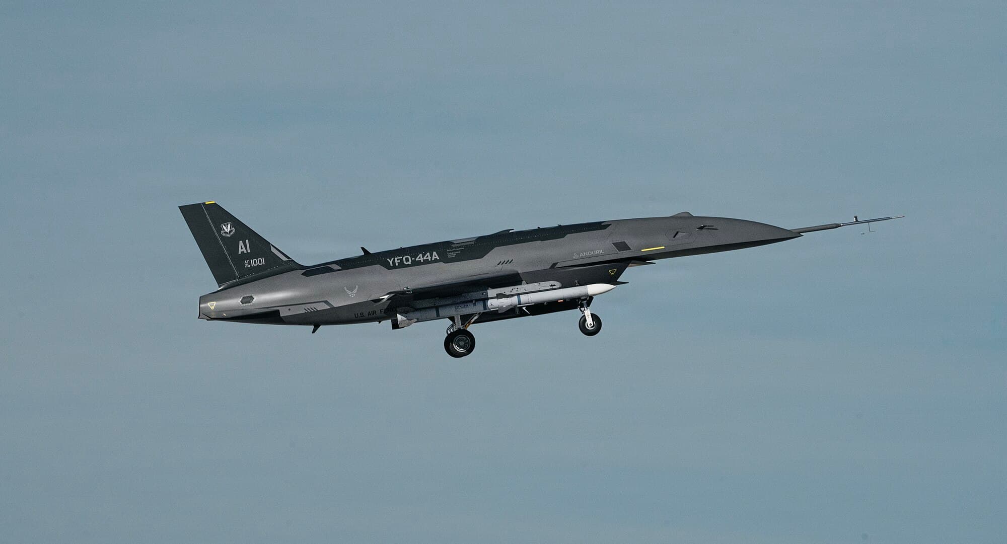 Anduril Fury autonomous combat drone in flight showing its sleek jet-powered airframe design