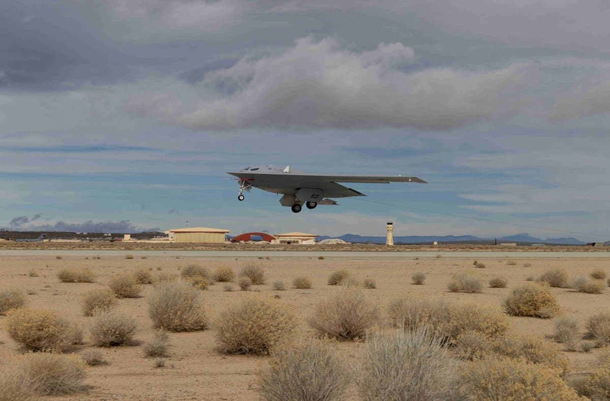 B-21 Raider stealth bomber in flight during testing at Edwards Air Force Base showing its flying wing design