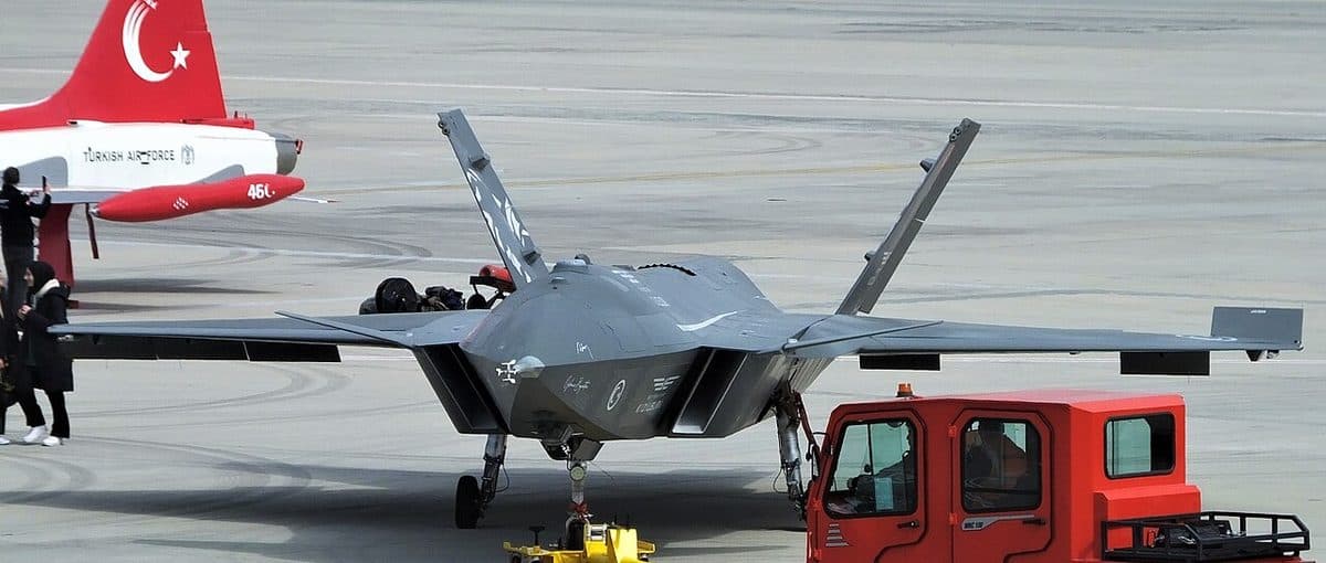 Bayraktar Kizilelma jet-powered unmanned combat aircraft on runway showing swept wing design and twin tail configuration