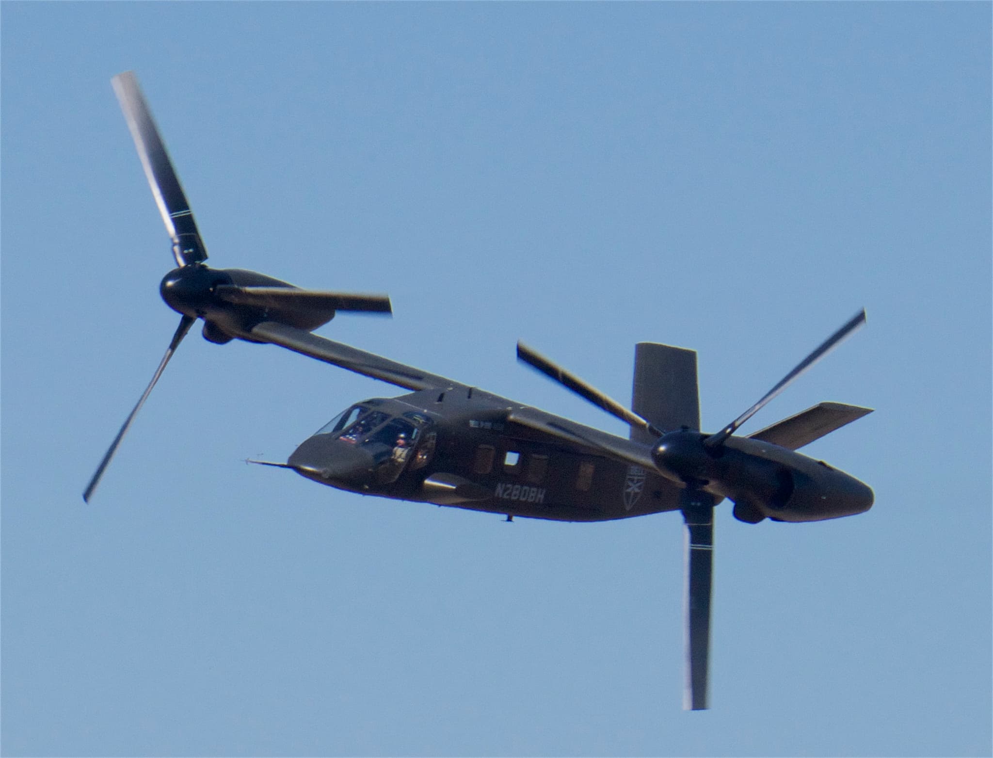 Bell V-280 Valor tiltrotor aircraft in flight with rotors tilted forward for airplane mode