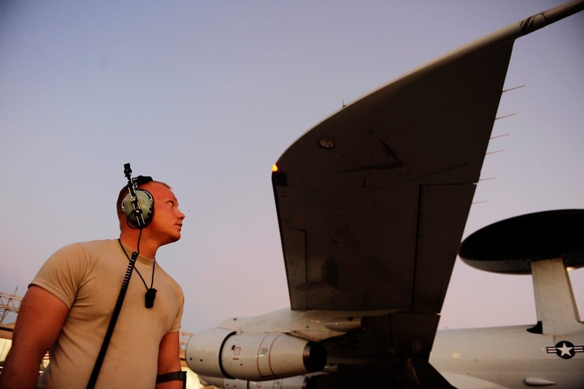 Boeing E-3 Sentry AWACS aircraft in flight with its distinctive rotodome