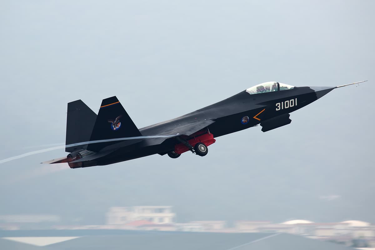 Shenyang J-35 stealth fighter in flight showing its twin-engine design and stealthy shaping