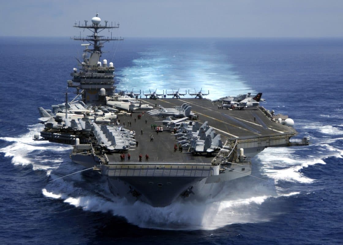USS Carl Vinson aircraft carrier plowing through the Indian Ocean with aircraft on the flight deck, the type of high-value target the DF-21D was designed to destroy