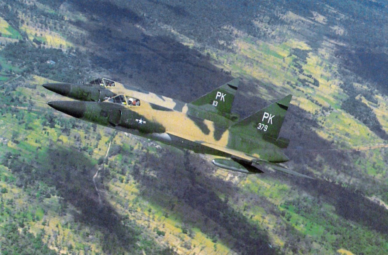 F-102 Delta Dagger interceptor in flight showing its distinctive delta wing and area-ruled fuselage