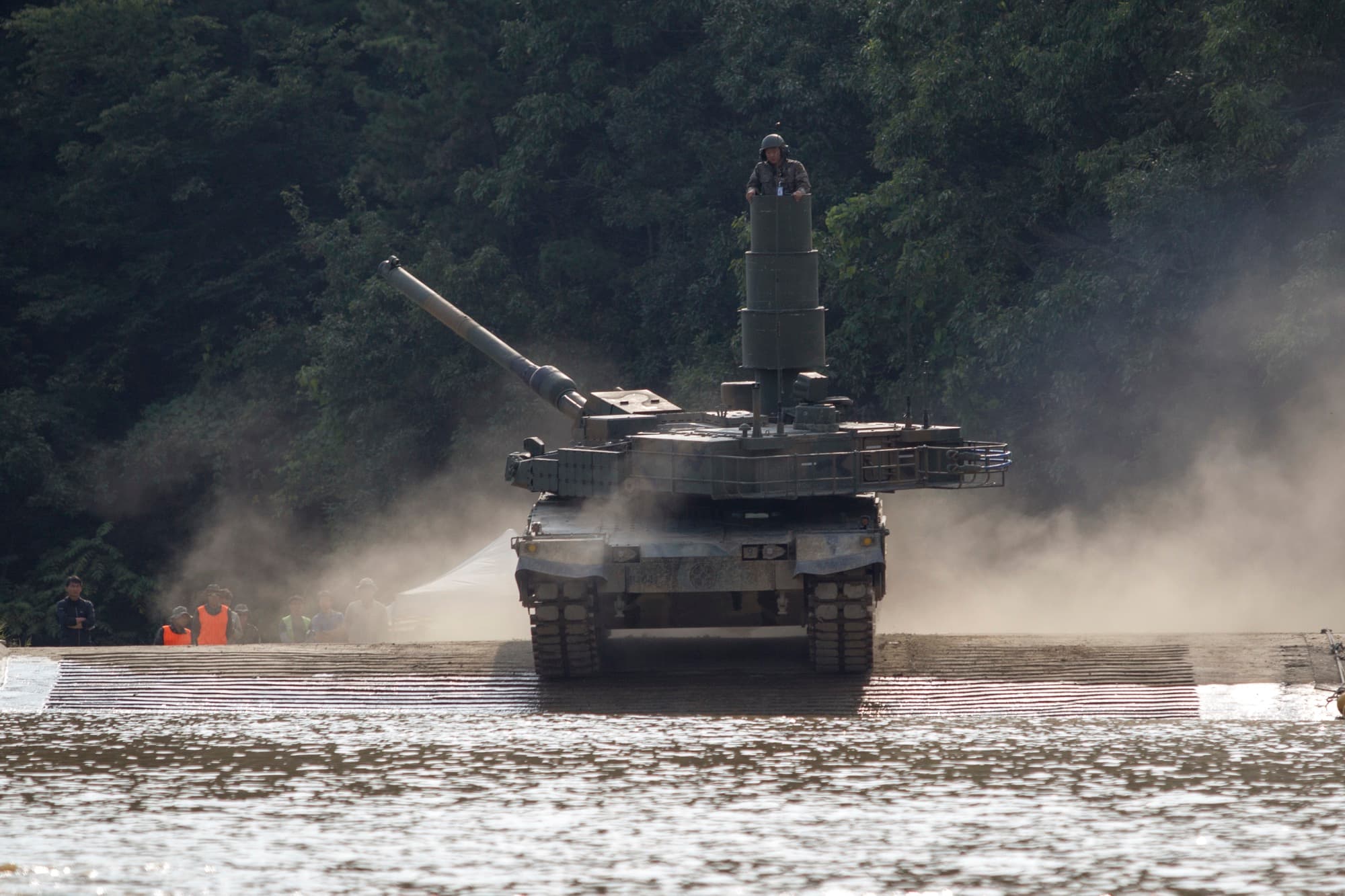 K2 Black Panther main battle tank driving at speed through terrain during an exercise