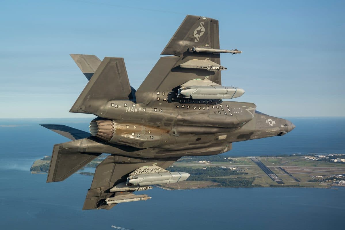 F-35C Lightning II carrying AGM-158C LRASM anti-ship missiles on external pylons during a flight test over Patuxent River