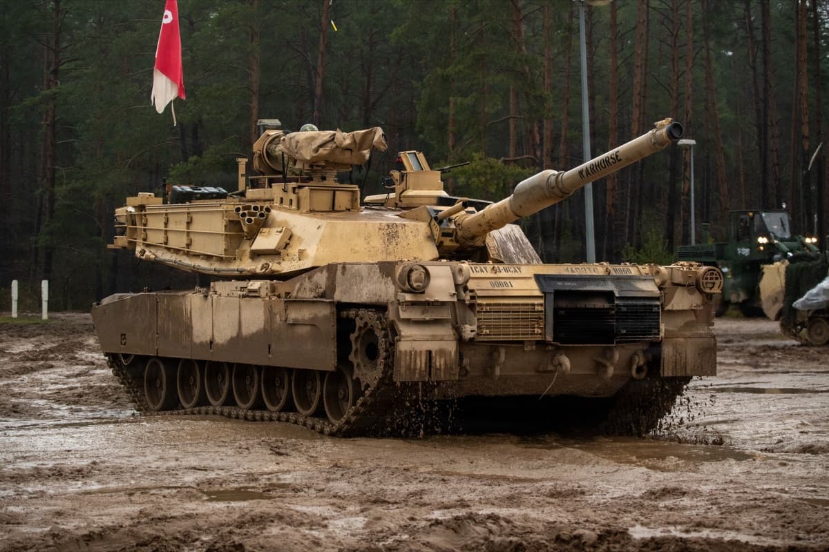 M1 Abrams tank through mud