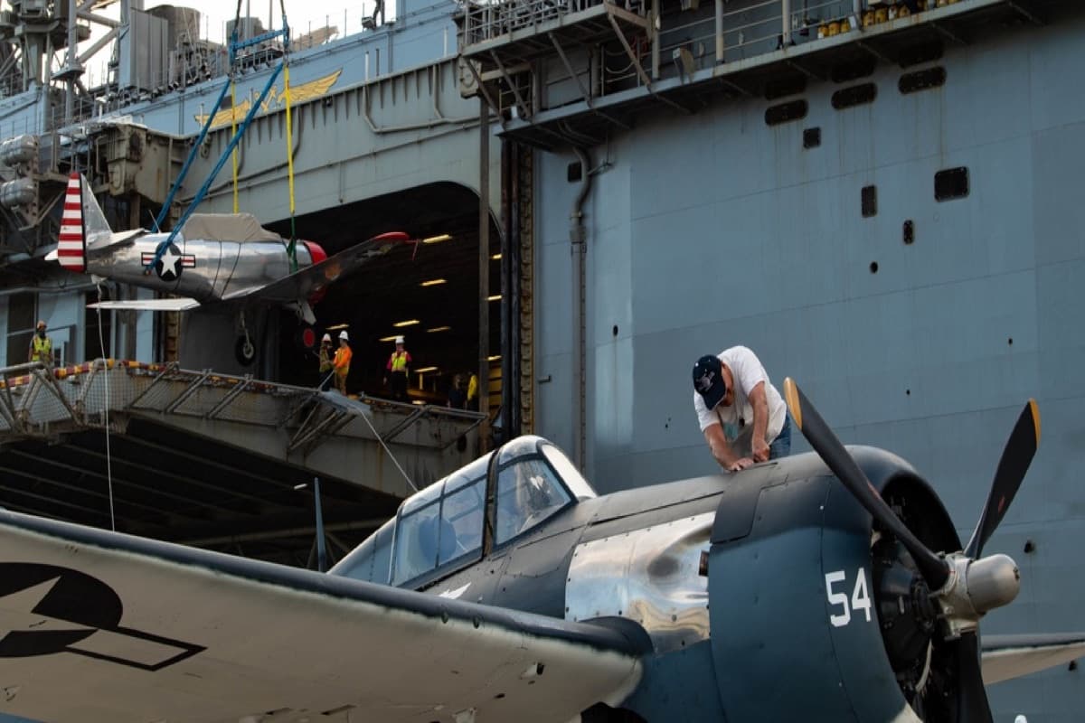 WWII-era warbird aircraft arriving at Pearl Harbor for the 75th anniversary commemoration