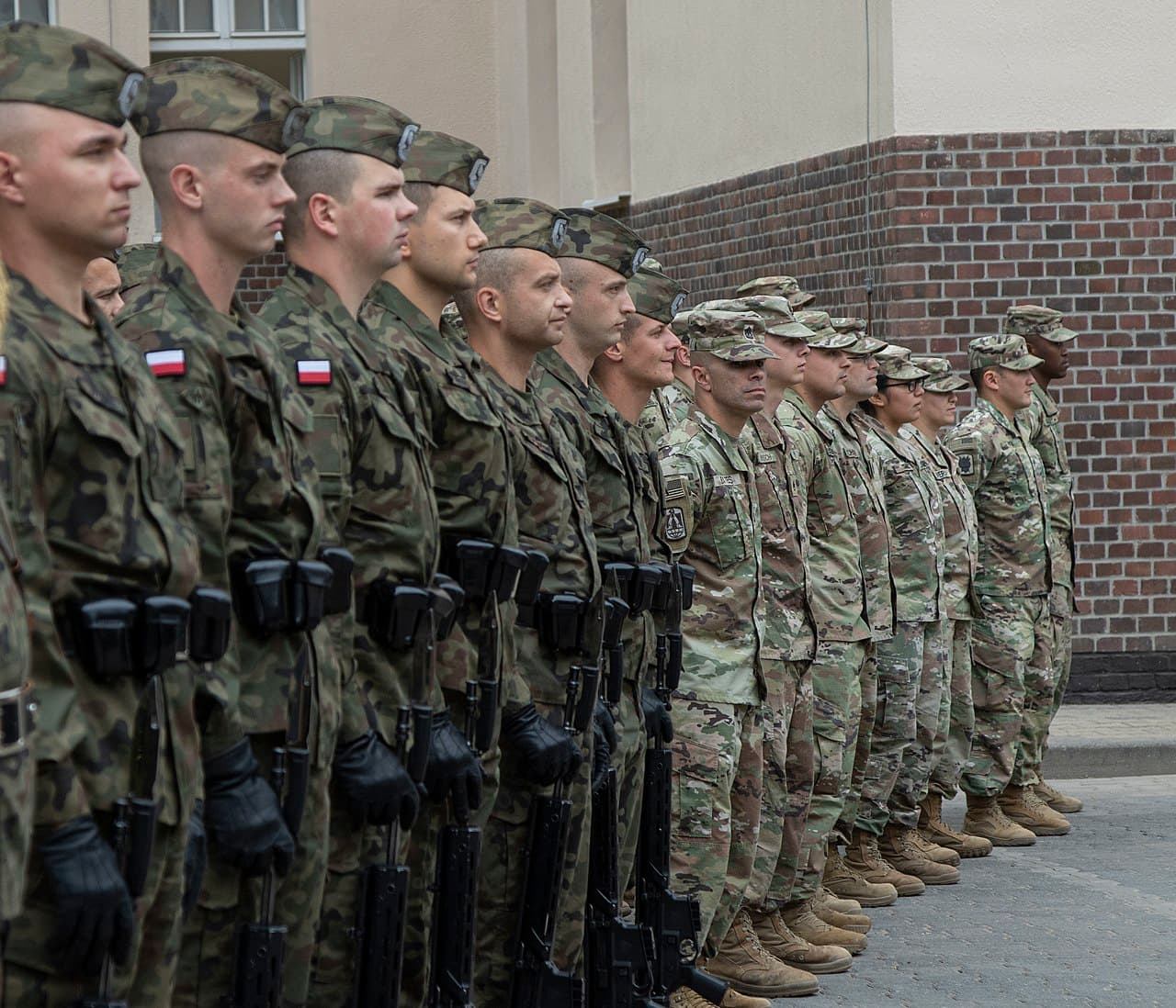Polish Army soldiers and armored vehicles during a NATO military exercise in eastern Poland