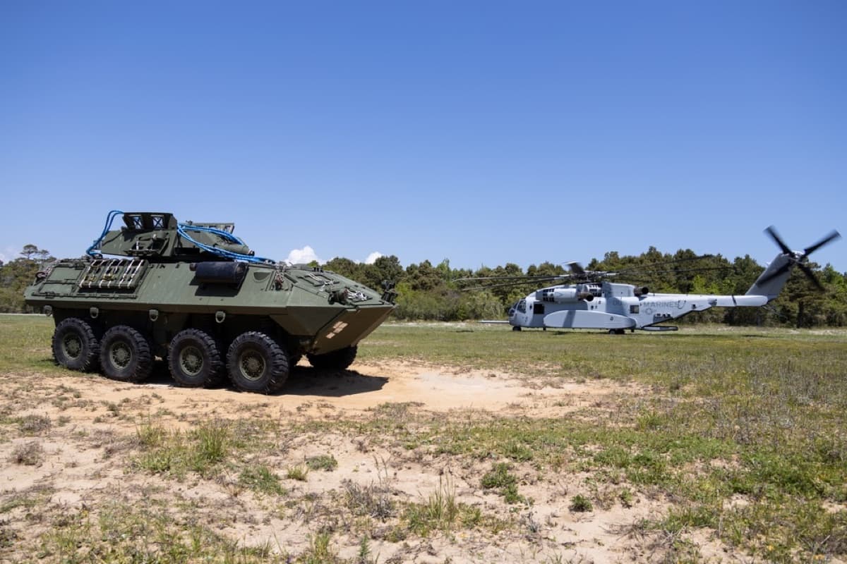 CH-53K King Stallion heavy-lift helicopter carrying a Light Armored Vehicle in a sling load