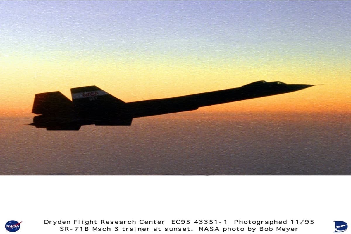 SR-71B Blackbird Mach 3 trainer aircraft in flight at sunset