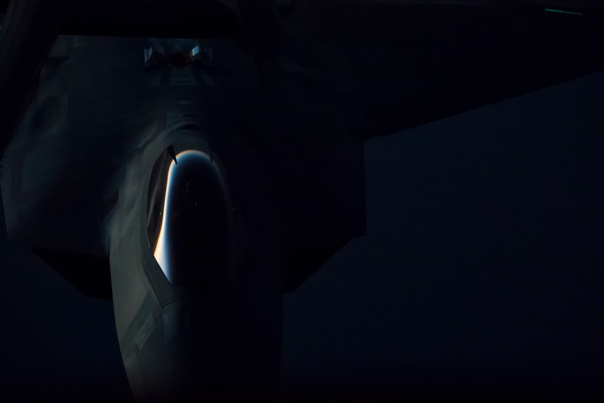 F-22 Raptor in flight demonstrating the clean aerodynamic lines of stealth aircraft design