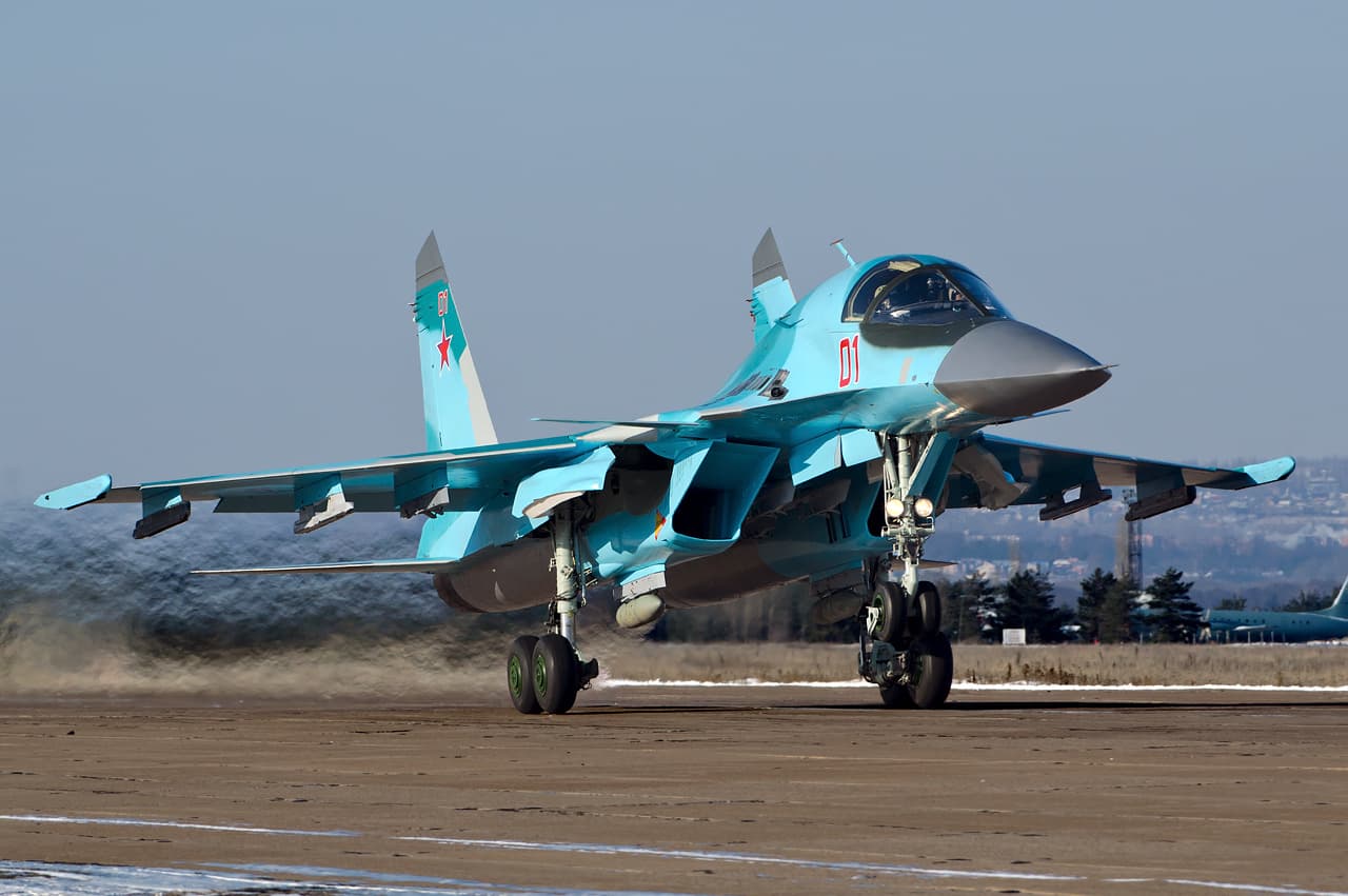 Sukhoi Su-34 Fullback strike aircraft in flight showing its distinctive flattened nose profile