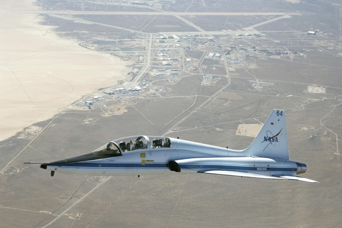 T-38 Talon trainer jet soaring through clear skies on a research mission