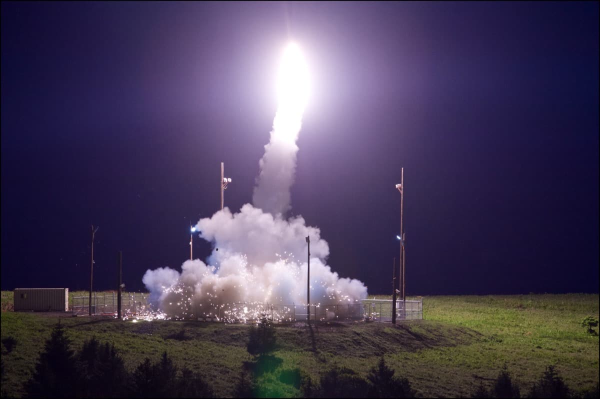 THAAD interceptor launching during a nighttime missile defense test at Kodiak, Alaska