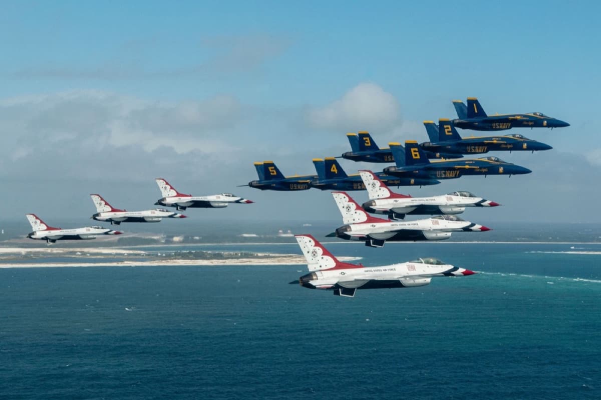 USAF Thunderbirds and Navy Blue Angels flying in formation over Pensacola