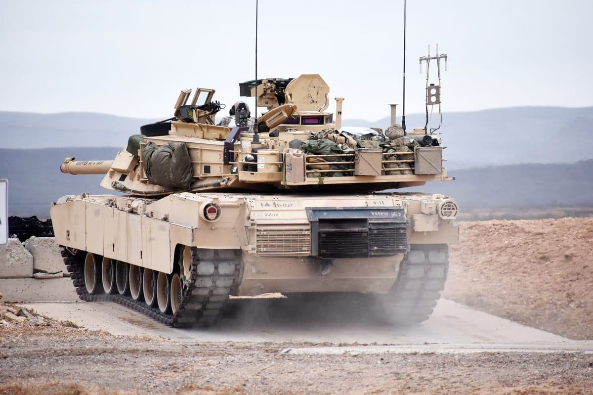 M1 Abrams tank equipped with Trophy Active Protection System during field testing at Fort Bliss showing the distinctive radar panels