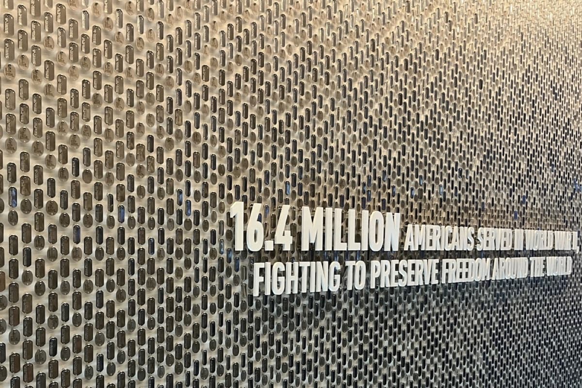 U.S. soldiers visiting the National World War II Museum exhibits and displays