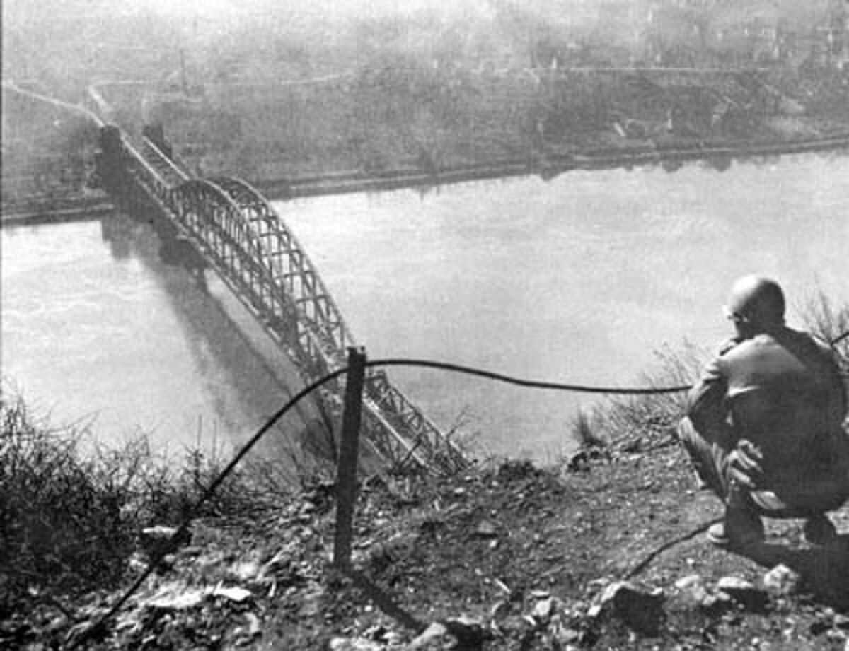 American soldiers crossing the Ludendorff Bridge at Remagen over the Rhine River, March 7, 1945