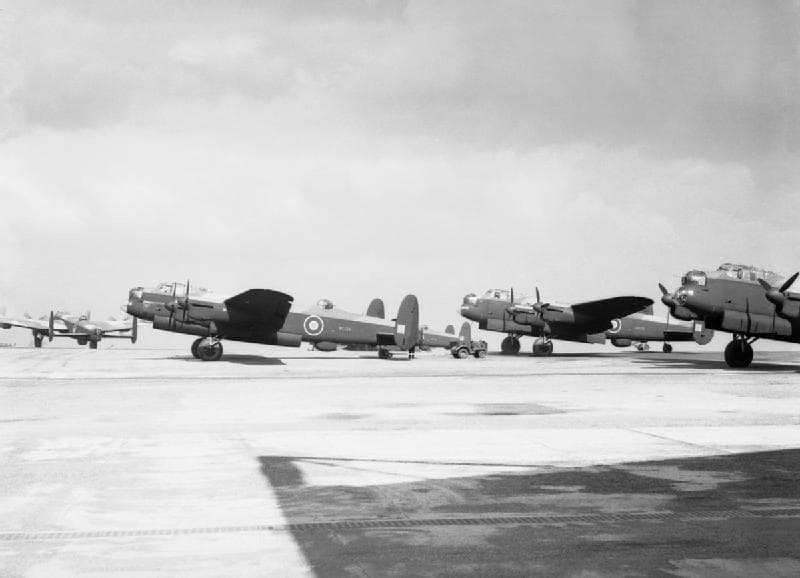 Newly completed Lancaster bombers lined up at the A.V. Roe factory airfield at Woodford