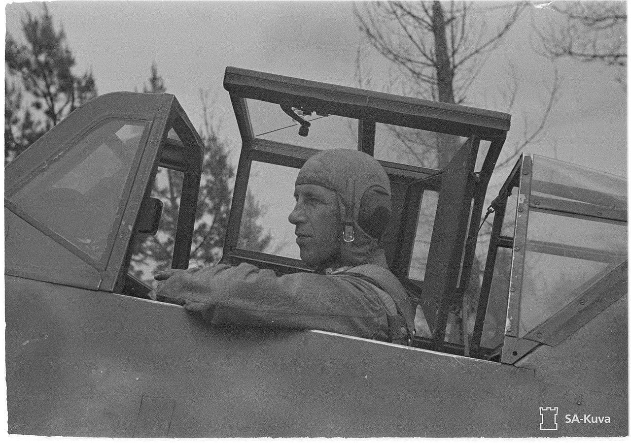 Finnish Air Force ace seated in the cockpit of a Messerschmitt Bf 109 G-6
