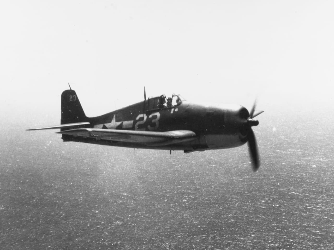 Grumman F6F-3 Hellcat of VF-9 in flight over the Pacific, February 1944