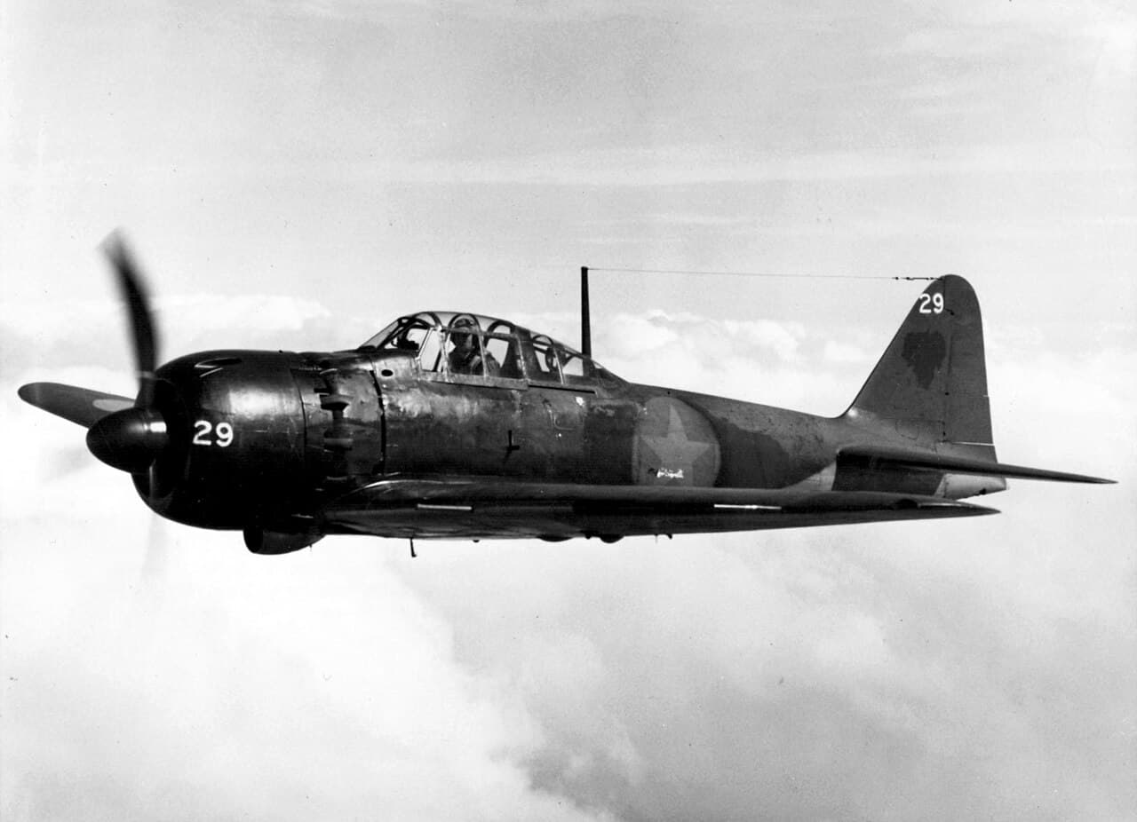 Mitsubishi A6M Zero in flight showing its distinctive silhouette