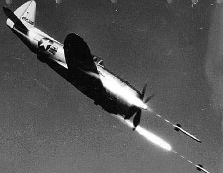 P-47D Thunderbolt firing rockets during a dive attack