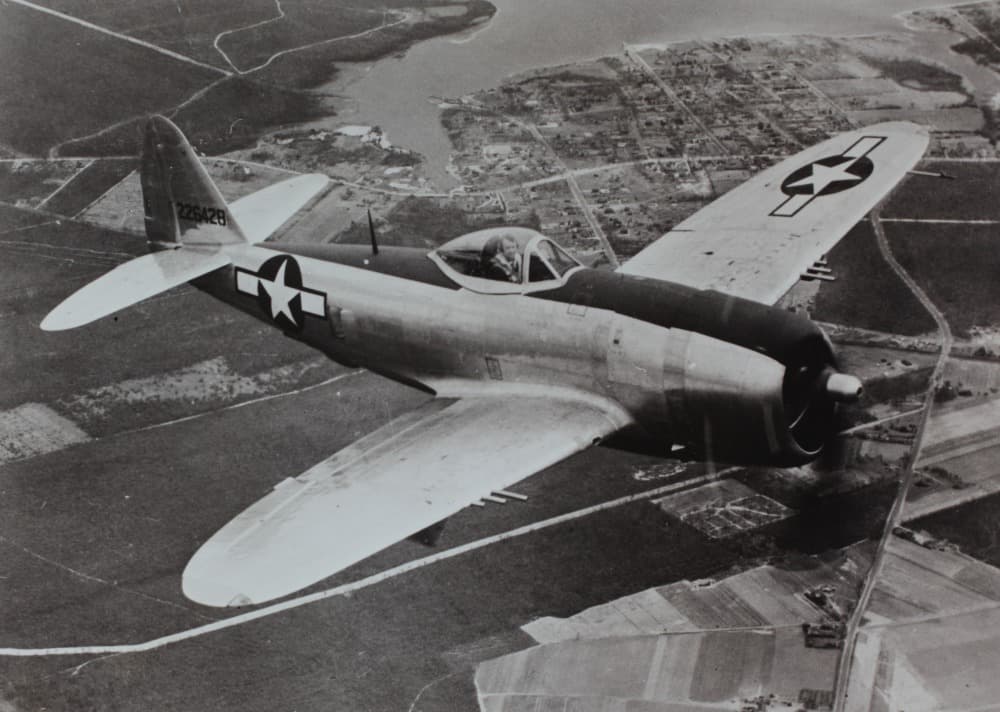 P-47D-25 bubbletop variant in flight showing the distinctive tear-drop canopy