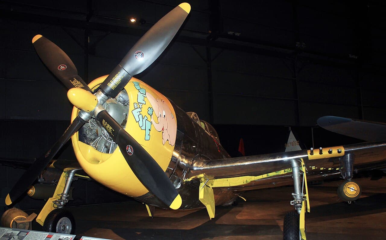 Republic P-47D Thunderbolt in flight, showing the fighter's massive radial engine and distinctive profile