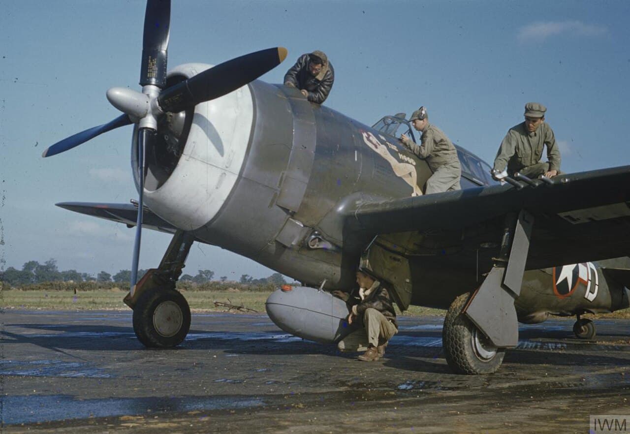 American ground crew servicing a P-47 Thunderbolt in England, 1943