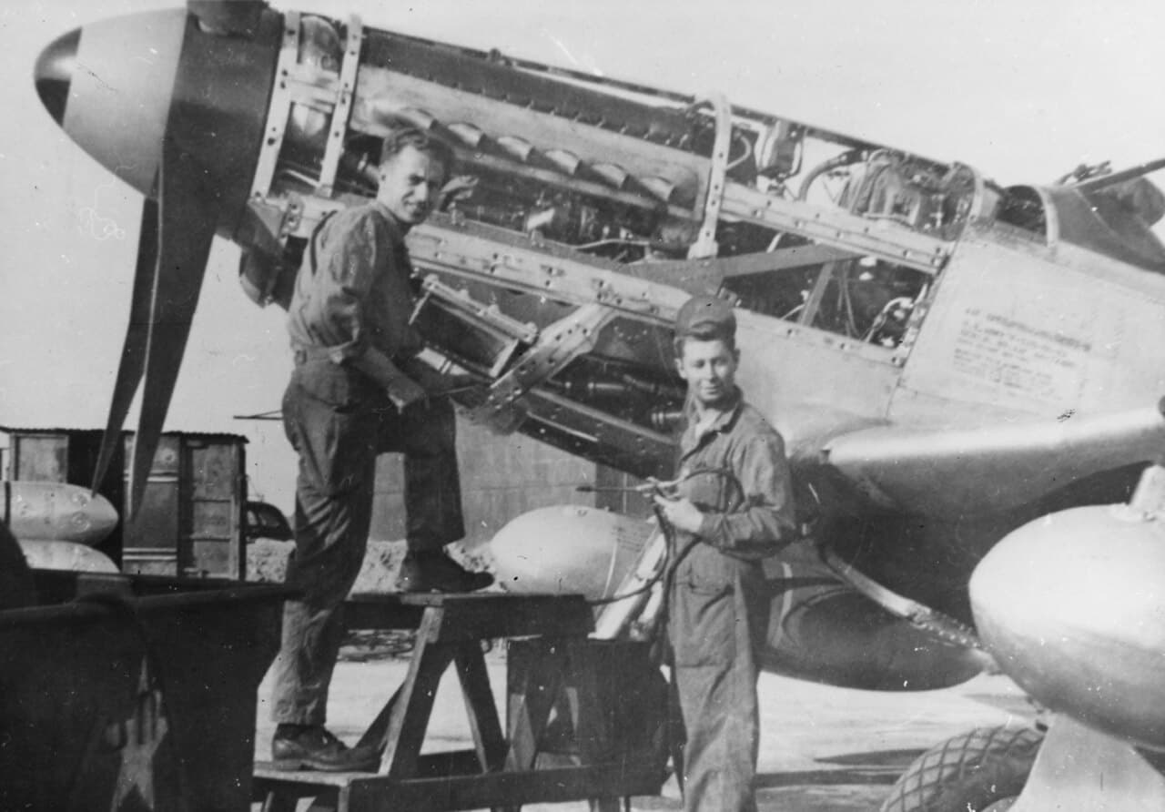 Ground crew of the 357th Fighter Group servicing a P-51 Mustang