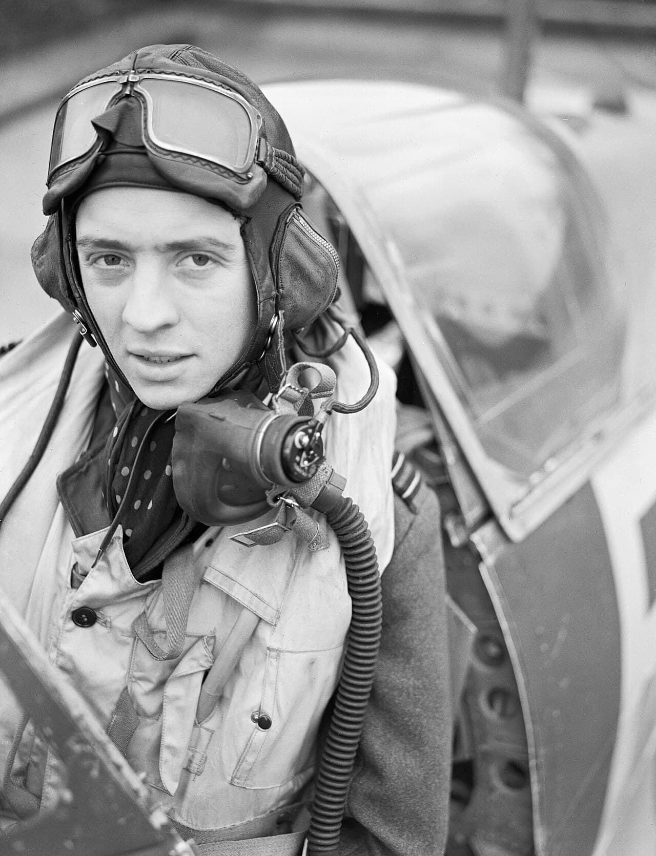 Wing Commander Richard Milne in the cockpit of his Spitfire Mk IX at Biggin Hill, February 1943