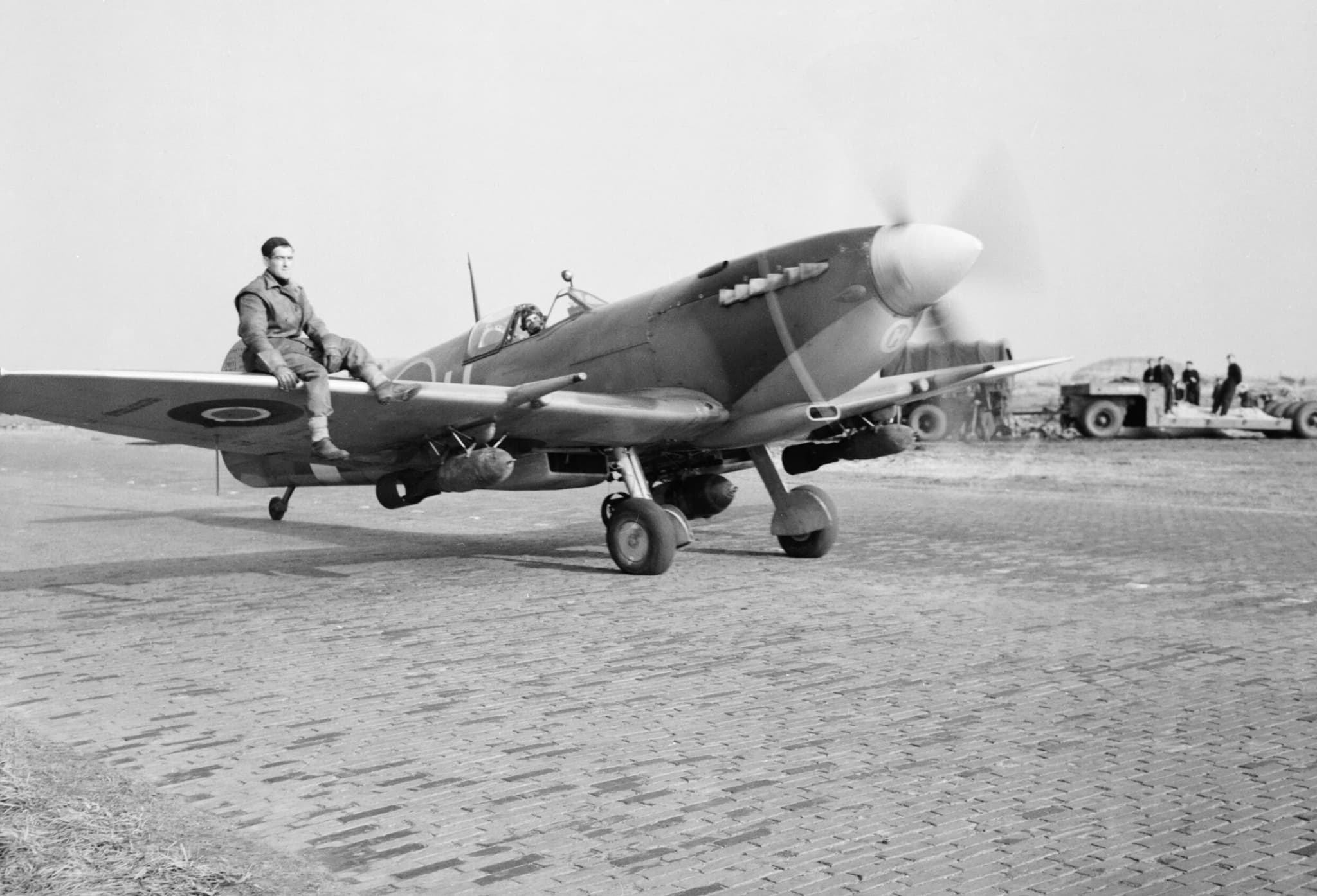 Spitfire Mk IXE of 412 Squadron RCAF taxiing with bombs at Volkel, Netherlands, 1944