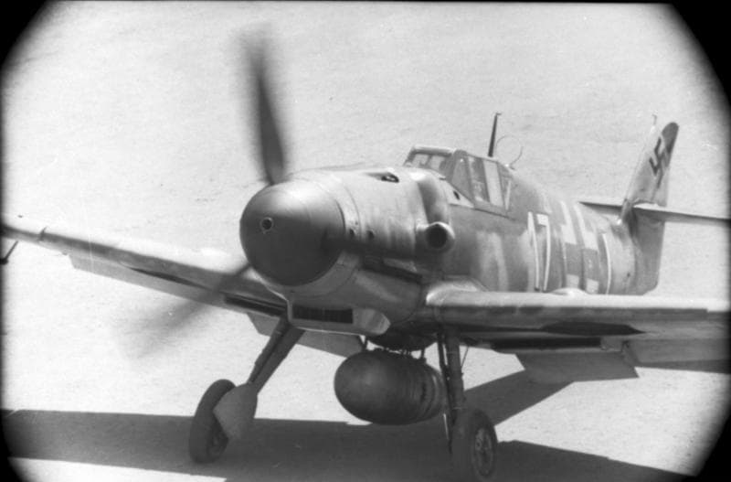 Bf 109G on the ground, close-up angled shot showing nose and cockpit