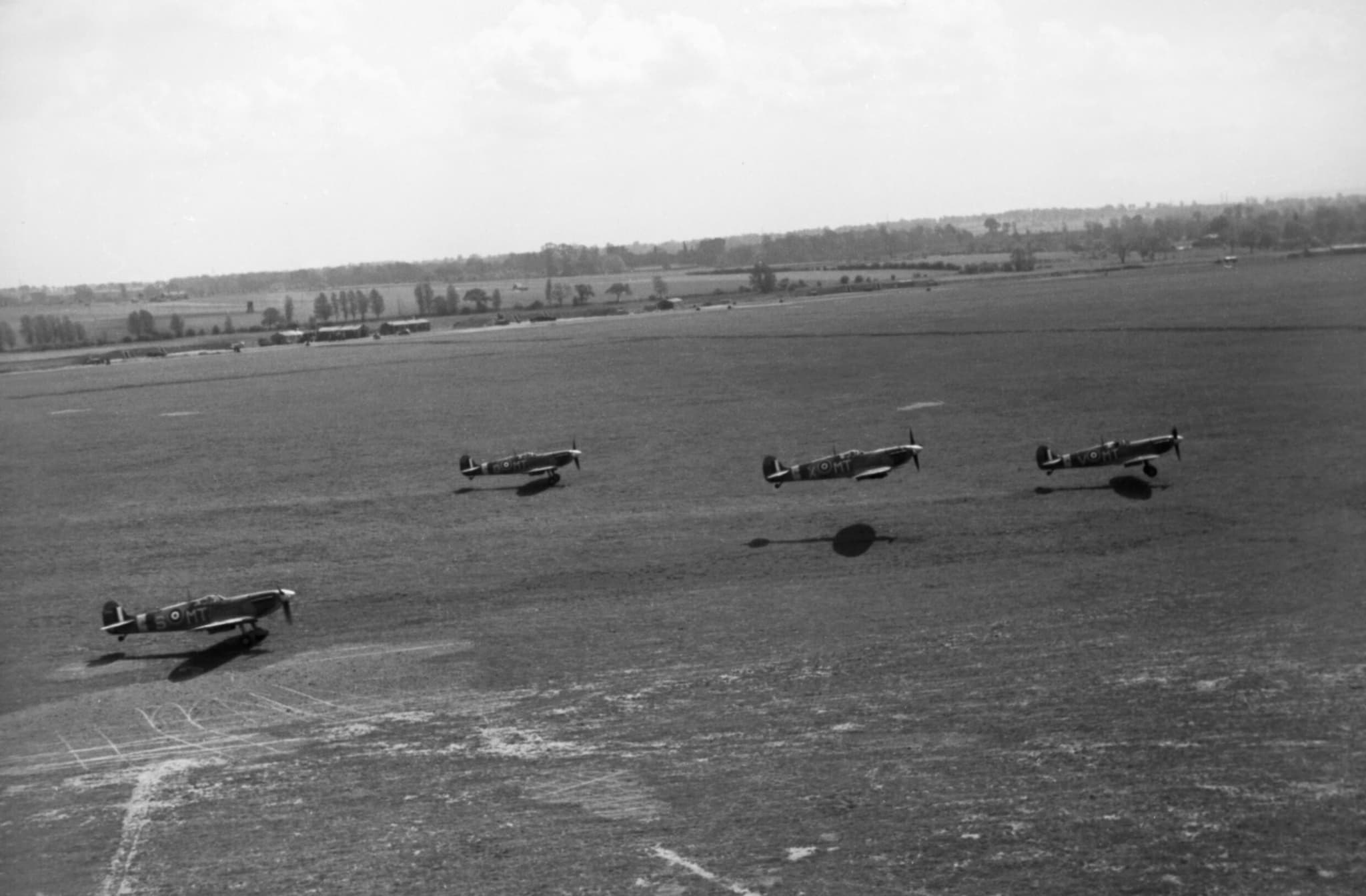 Spitfires of 122 Squadron taking off from Hornchurch for a fighter sweep over France, May 1942