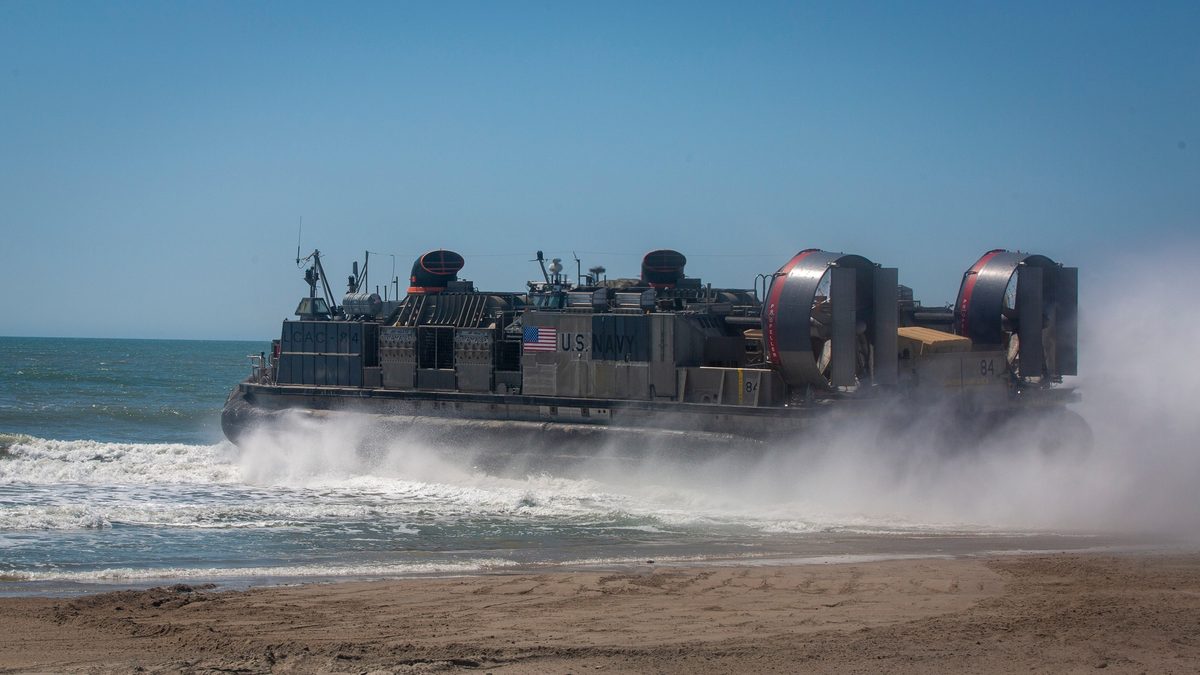 U.S. Navy LCAC Landing Craft Air Cushion hovercraft approaching a beach