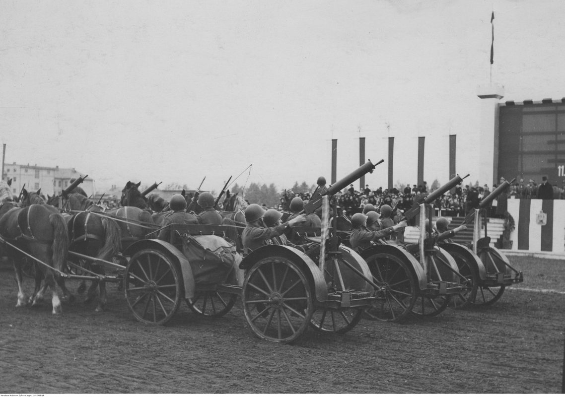 Tachanka horse-drawn machine gun cart with crew in action