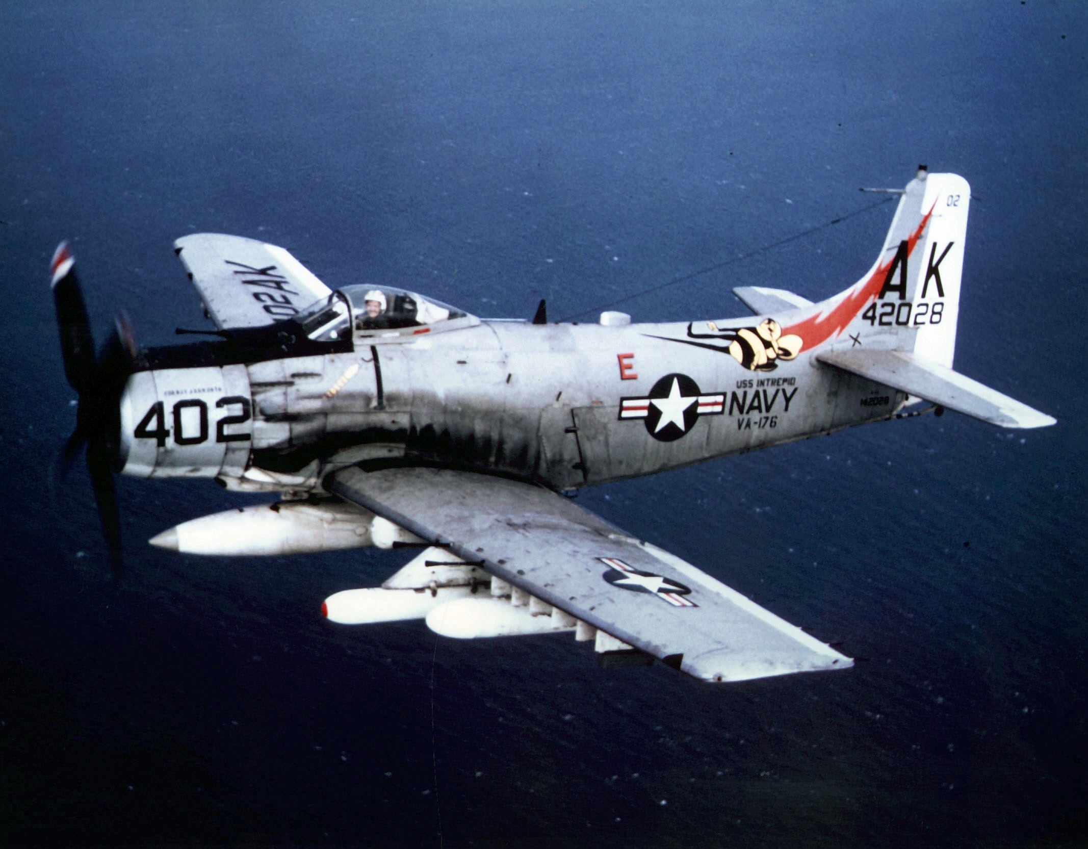 A-1 Skyraider loaded with ordnance during Vietnam War operations showing the aircraft's massive weapons carrying capability