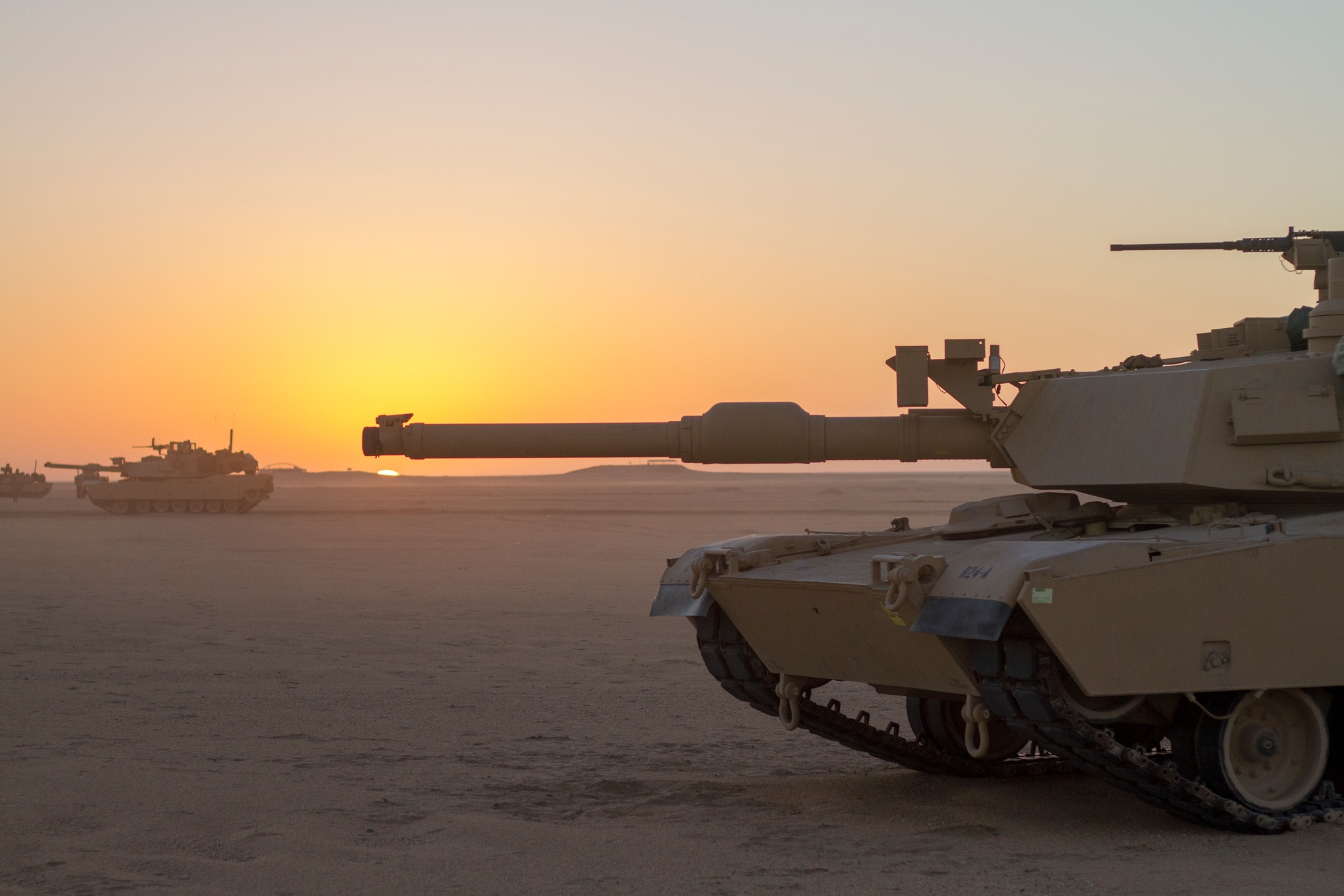 M1A1 Abrams tank in the desert terrain of southern Iraq during the Battle of 73 Easting in February 1991