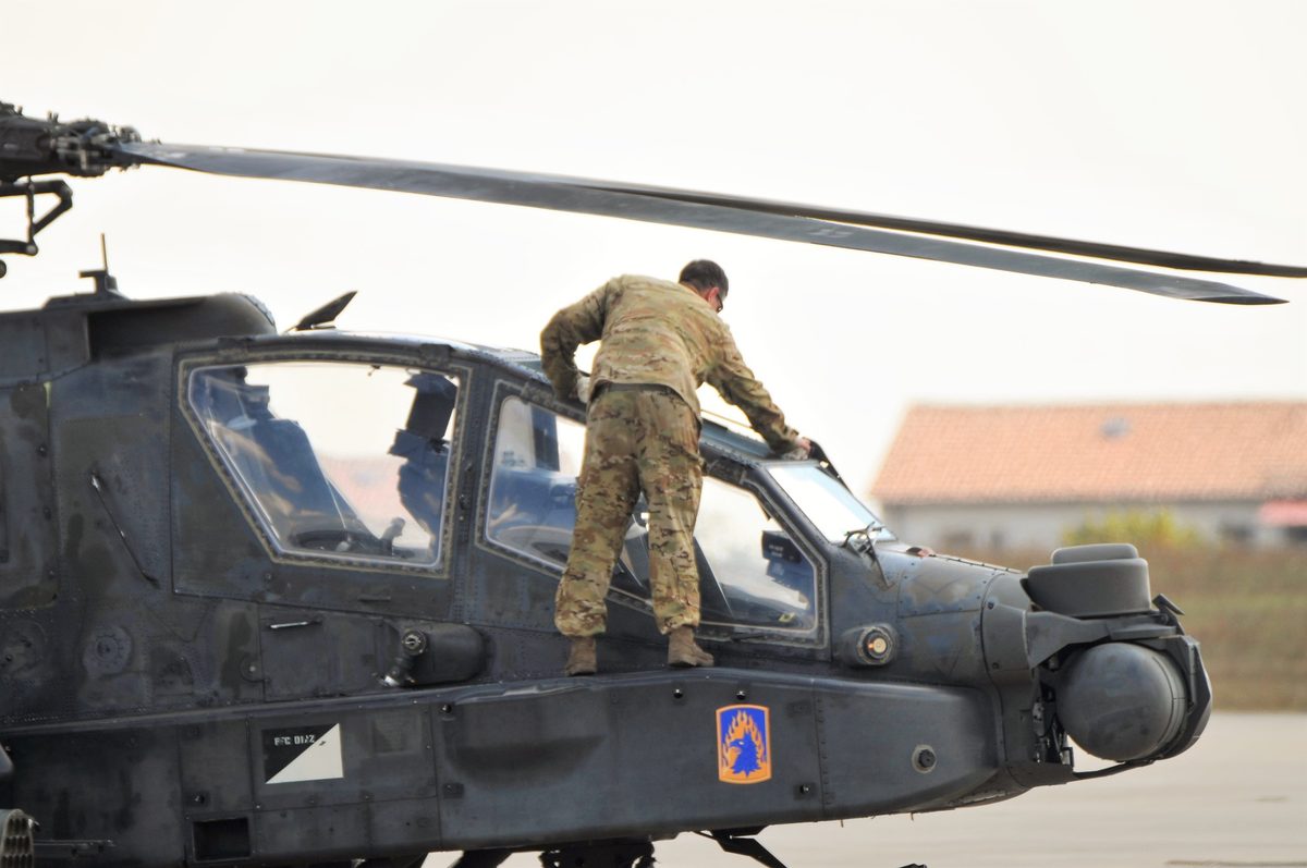Close-up view of AH-64D Apache Longbow showing the AN/APG-78 radar dome mounted above the main rotor