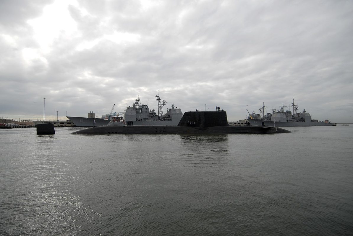 HMS Astute at Naval Station Norfolk with warships visible in the background