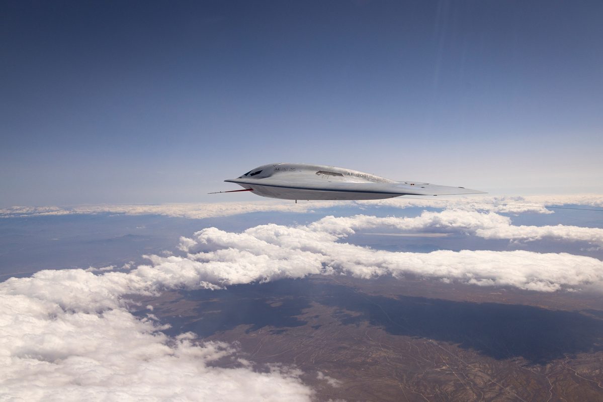 B-21 Raider during flight testing at Edwards Air Force Base showing the bomber in level flight over the desert