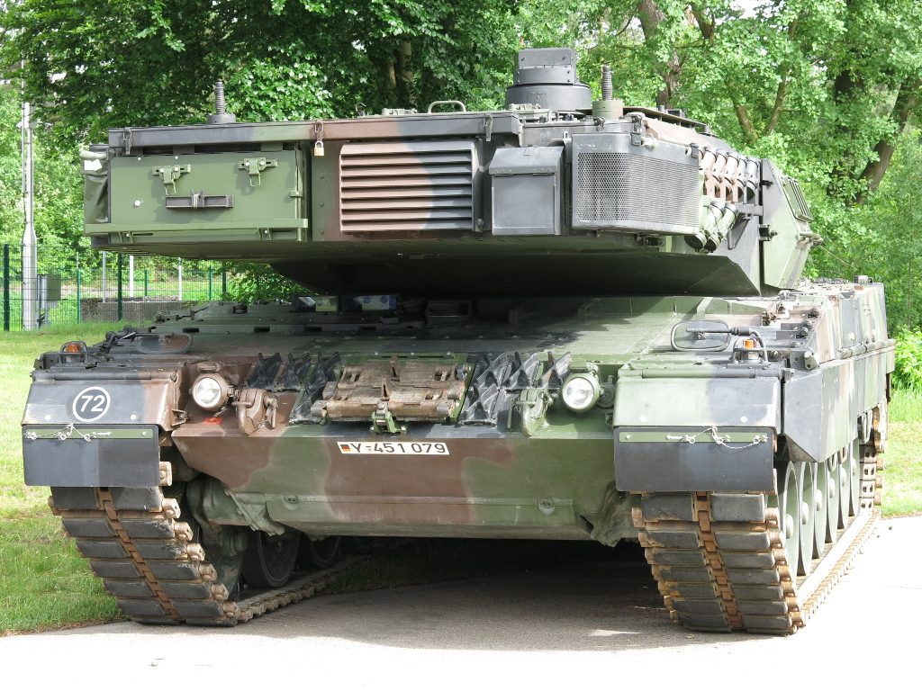 Leopard 2A7 main battle tank during field maneuvers, showing its distinctive angular turret armor and L/55 smoothbore gun