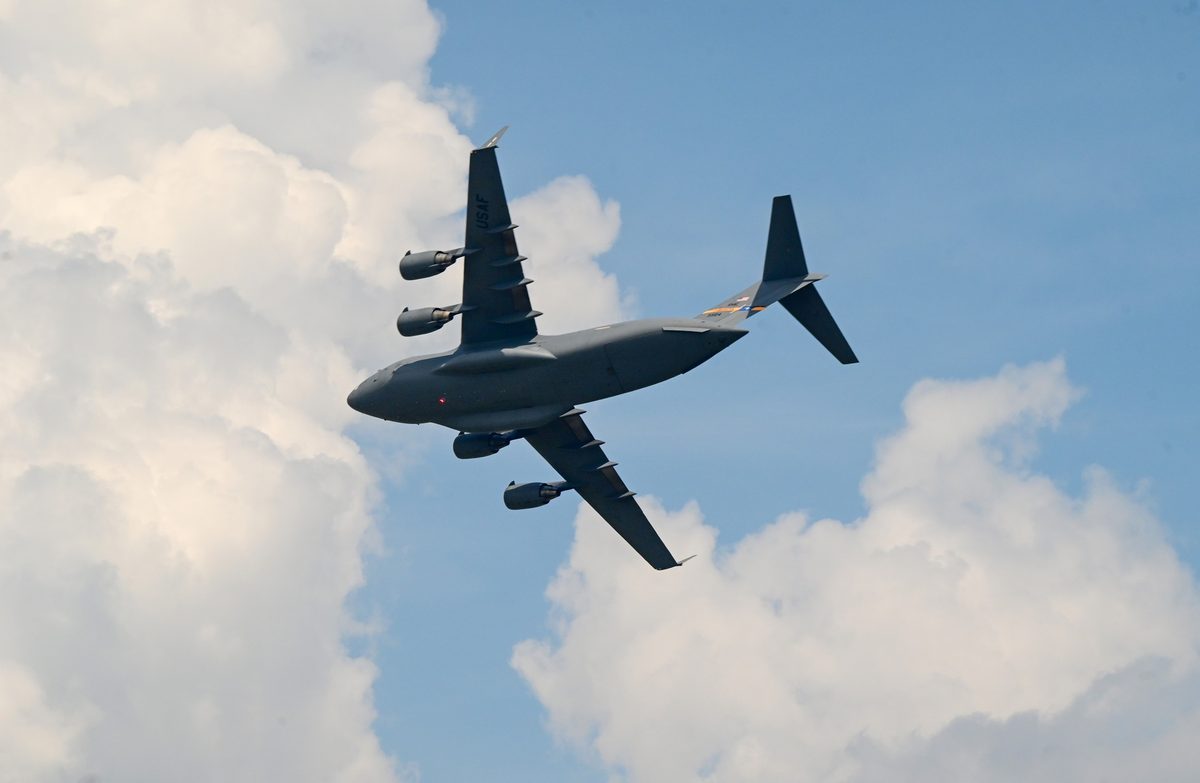C-17 Globemaster III during a demonstration flight showing the aircraft's massive size and four-engine configuration
