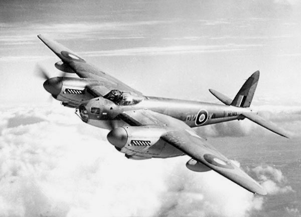 De Havilland Mosquito in flight during World War II showing its twin-engine configuration and wooden construction