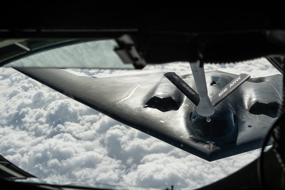 B-2 Spirit stealth bomber photographed from above during aerial refueling operations
